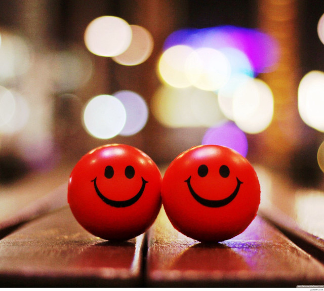 Two red balls with faces free wallpaper for tablet - medium preview image