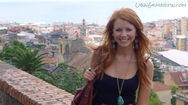 Woman red hair balcony city free wallpaper for desktop - medium preview image