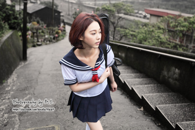 Woman backpack bowtie walking street free wallpaper for desktop - medium preview image