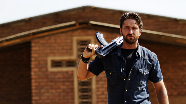 Man holding scissors brick building free wallpaper for desktop - medium preview image