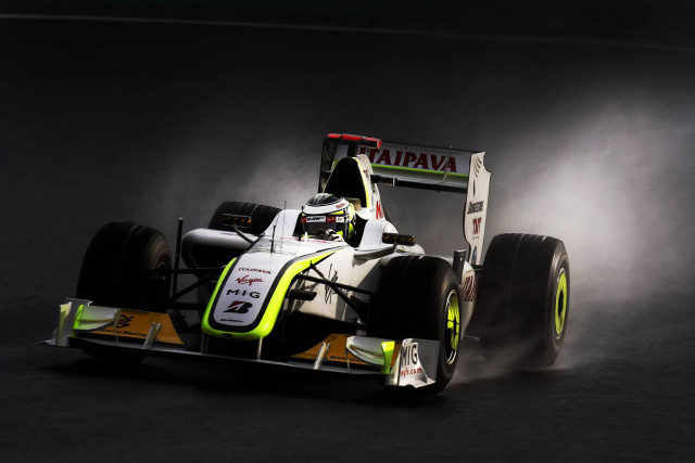 Man driving race car smoke free wallpaper for desktop - medium preview image