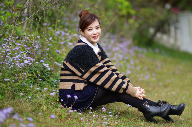 Woman smiling field flowers sitting free wallpaper for desktop - medium preview image