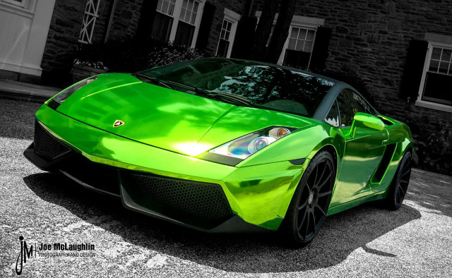 Green sports car brick building free wallpaper for desktop - medium preview image
