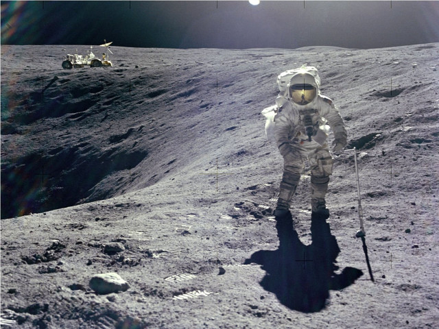 Astronaut moon walking vehicle background free wallpaper for desktop - medium preview image