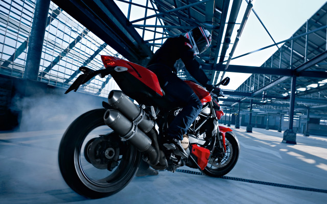 Man riding red motorcycle night free wallpaper for desktop - medium preview image