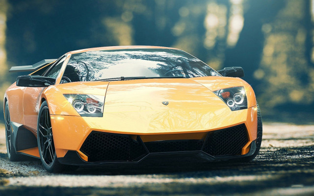 Yellow sports car woods gravel free wallpaper for desktop - medium preview image
