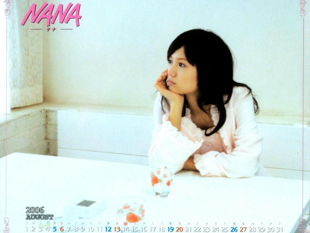 Woman sitting table coffee calendar free wallpaper for desktop - medium preview image