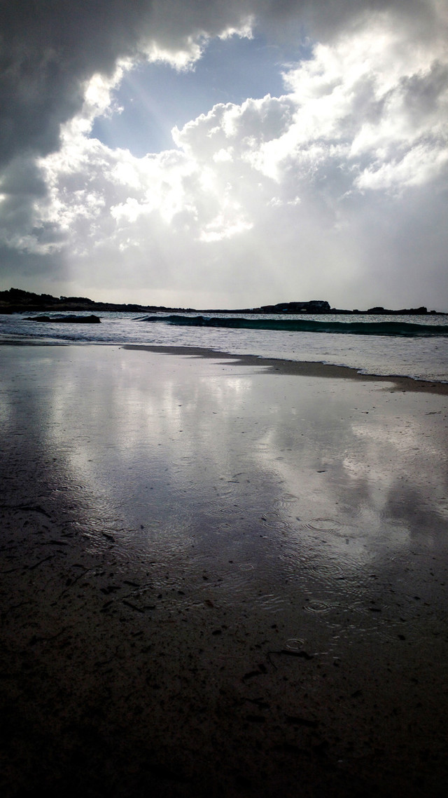 Beach water clouds person walking free wallpaper for mobile - medium preview image