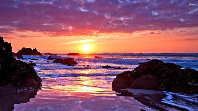 Sunset ocean rocks water person free wallpaper for desktop - medium preview image