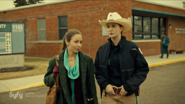 Man woman walking street building free wallpaper for desktop - medium preview image