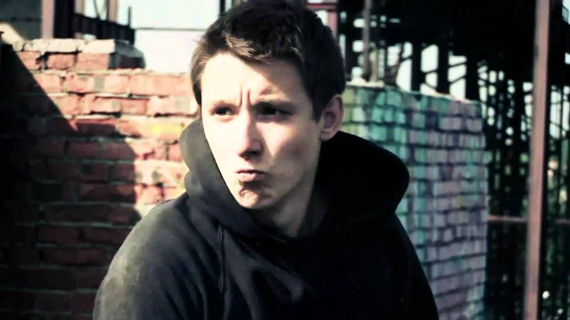 Man black hoodie brick wall free wallpaper for desktop - medium preview image