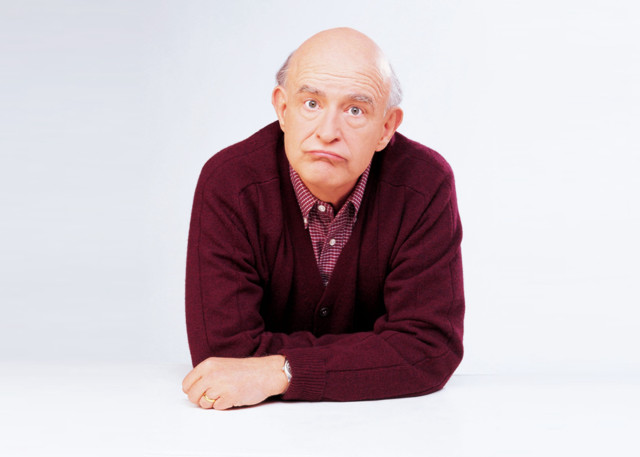 Man sitting floor arms crossed free wallpaper for desktop - medium preview image