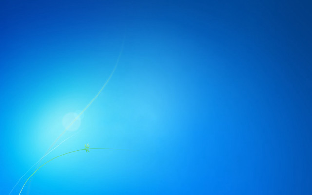 Blue sky green kite flying free wallpaper for desktop - medium preview image