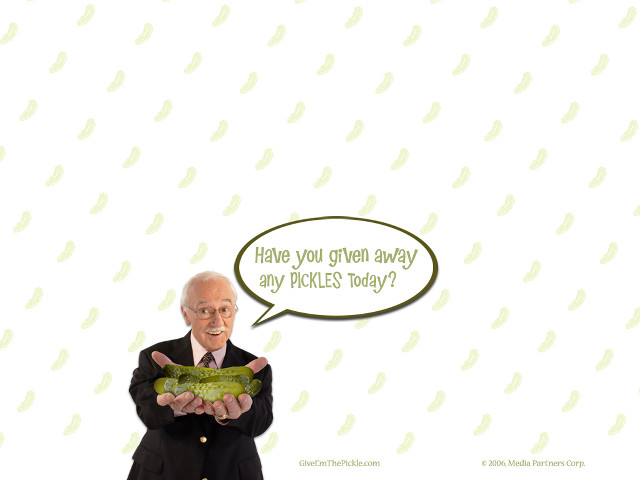 Man holding green object thought free wallpaper for desktop - medium preview image