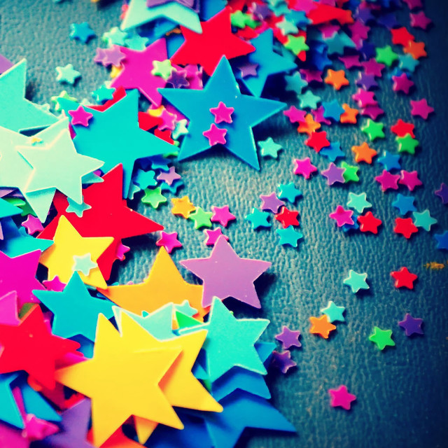 Colorful stars pile table black free wallpaper for tablet - medium preview image