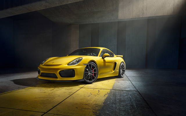 Yellow porsche parking garage spotlight free wallpaper for desktop - medium preview image