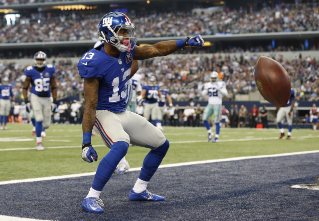 Football player throwing ball field free wallpaper for desktop - medium preview image