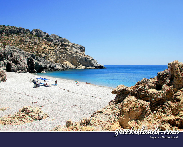 Beach rocky cliff blue water free wallpaper for desktop - medium preview image