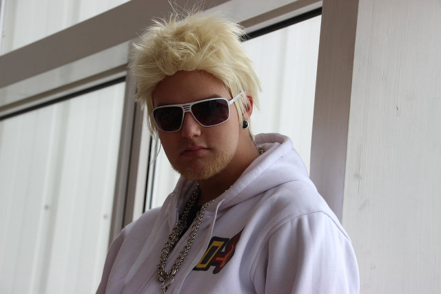 Blonde man sunglasses cellphone window free wallpaper for desktop - medium preview image