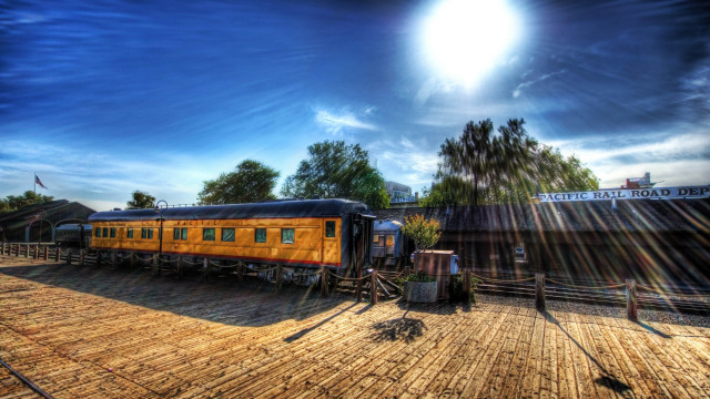 Train fence trees clocktower cityscape free wallpaper for desktop - medium preview image