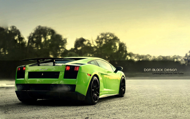 Green sports car parked road #2 free wallpaper for desktop - medium preview image