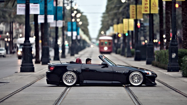Black convertible car driving street free wallpaper for desktop - medium preview image