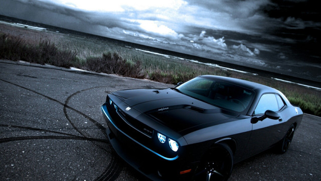 Black sports car ocean cloudy free wallpaper for desktop - medium preview image