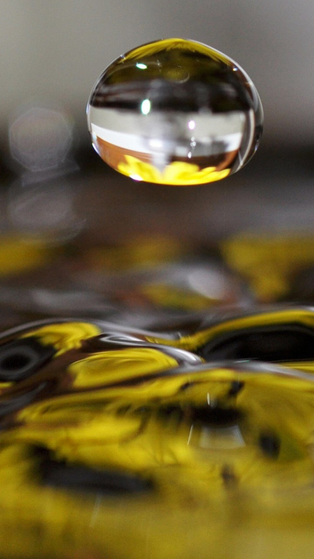 Water drop yellow black tabletop free wallpaper for mobile - medium preview image