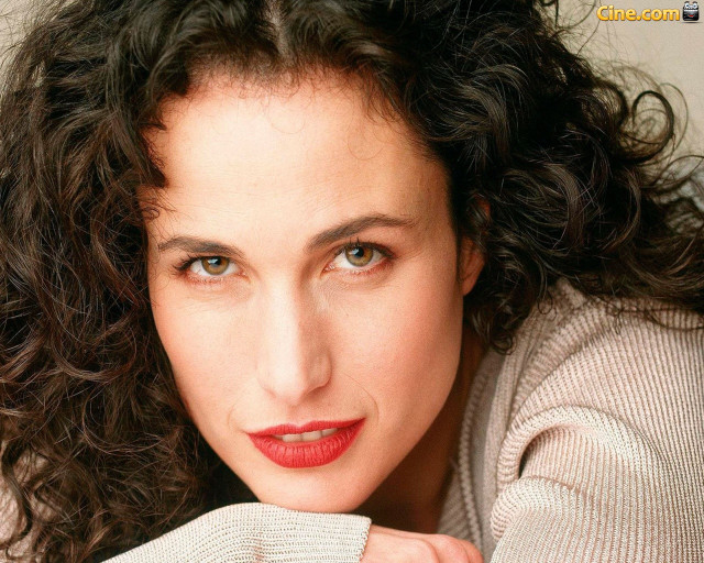 Woman curly hair sweater posing free wallpaper for desktop - medium preview image