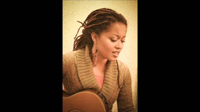 Woman dreadlocks playing guitar room free wallpaper for desktop - medium preview image
