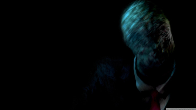 Man suit tie blurry face free wallpaper for desktop - medium preview image