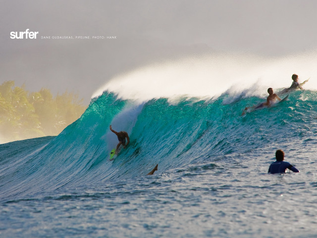 Three surfers riding large wave free wallpaper for desktop - medium preview image
