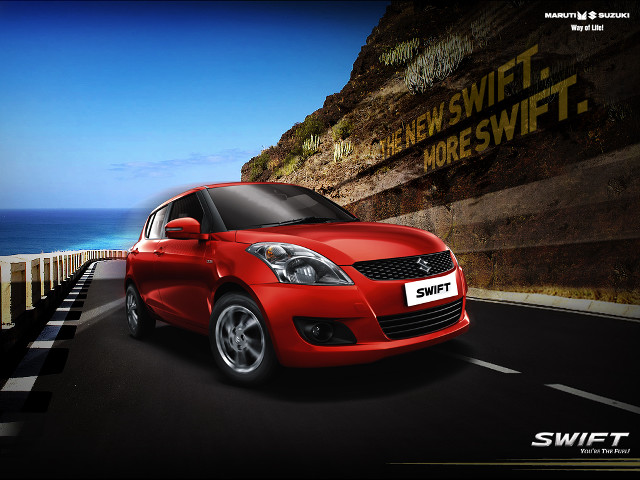 Red car driving cliff side free wallpaper for desktop - medium preview image