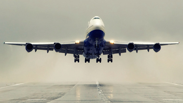 Large jetliner cloudy sky runway free wallpaper for desktop - medium preview image