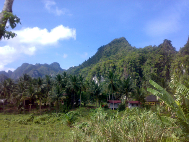 Lush green hillside house mountain free wallpaper for desktop - medium preview image