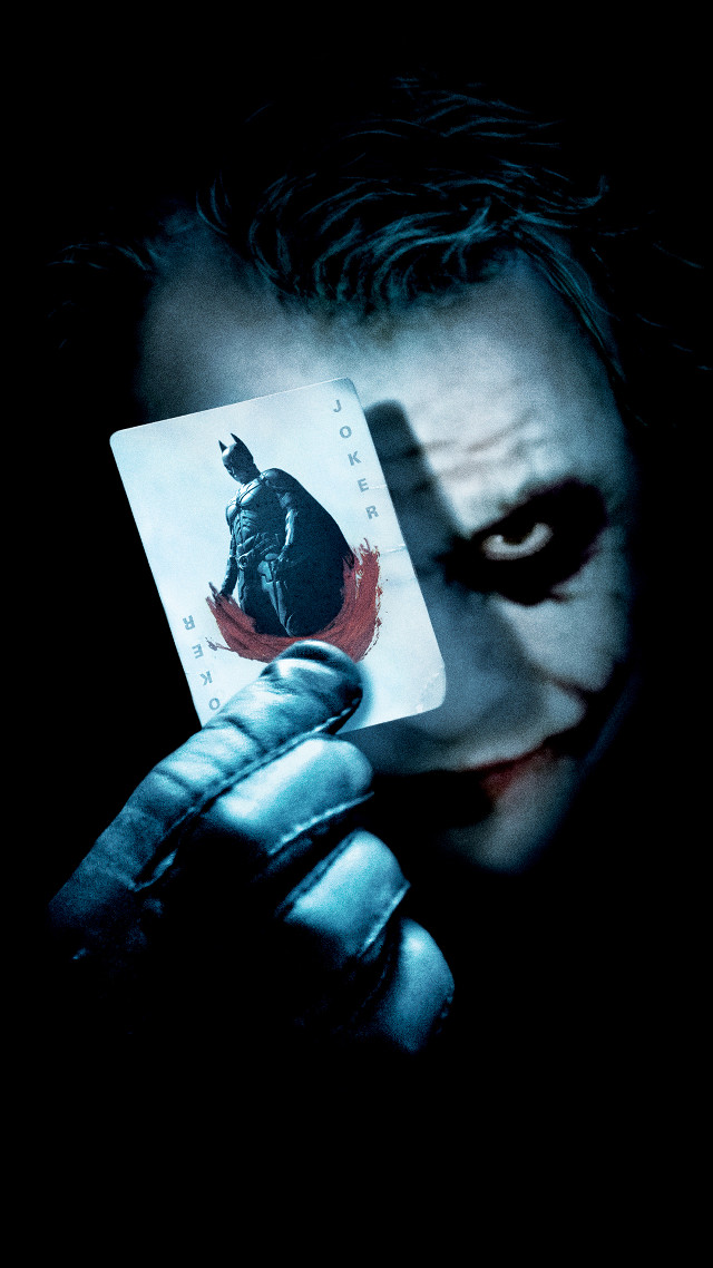 Man holding joker card knife #5 free wallpaper for mobile - medium preview image