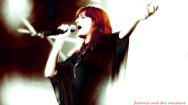 Red haired singer microphone wings free wallpaper for desktop - medium preview image
