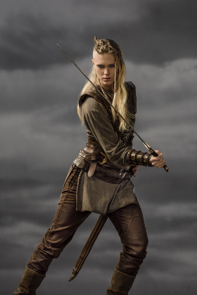 Woman costume sword cloudy dark free wallpaper for mobile - medium preview image