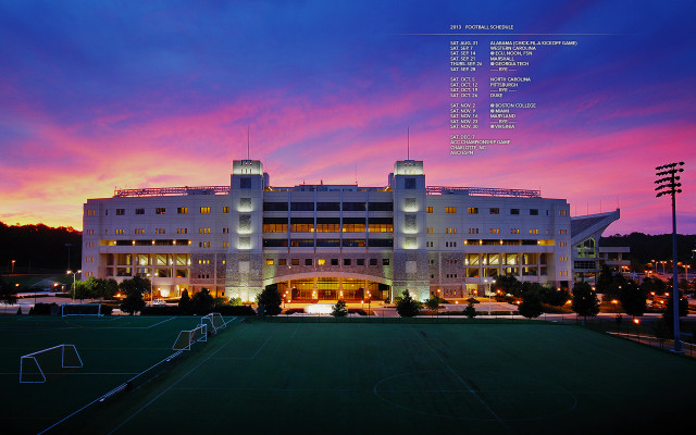 Large building soccer field dusk free wallpaper for desktop - medium preview image