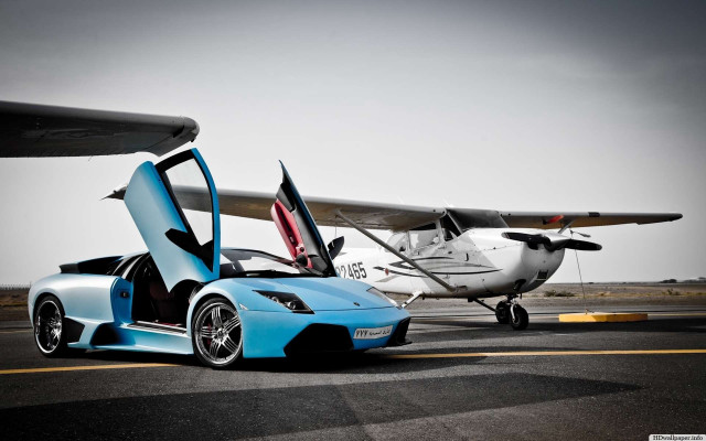 Blue sports car airplane runway free wallpaper for desktop - medium preview image