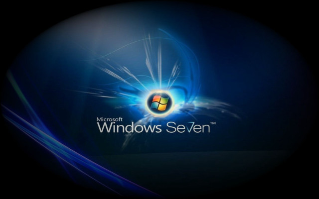 Blue background windows seven logo free wallpaper for desktop - medium preview image