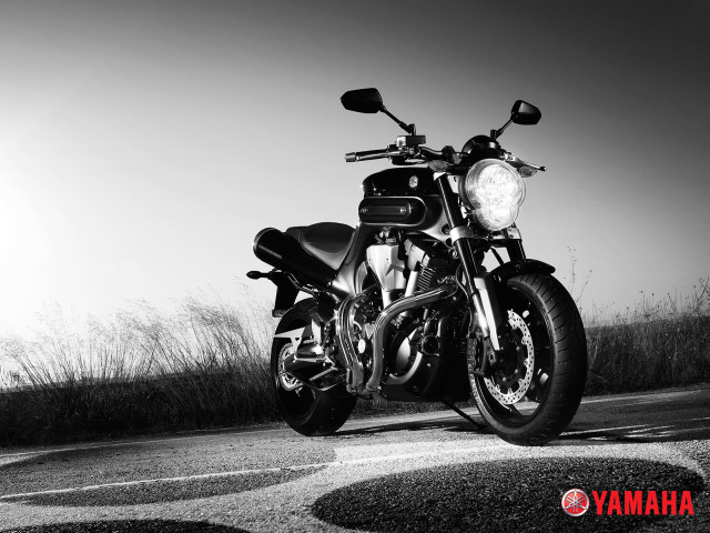 Black white motorcycle parked road free wallpaper for desktop - medium preview image