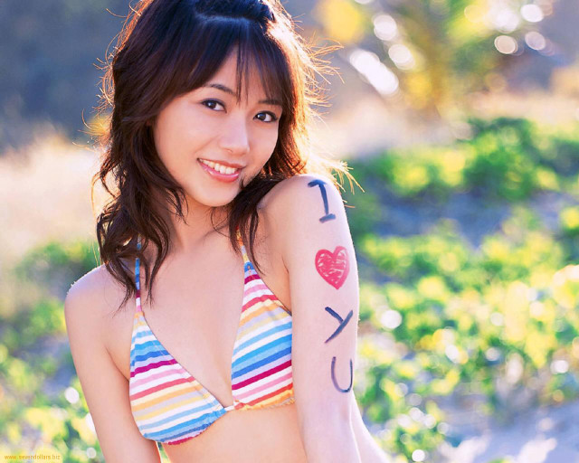 Woman tattoo bikini top shorts free wallpaper for desktop - medium preview image