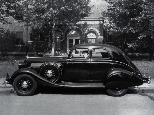 Black white car parked building #2 free wallpaper for desktop - medium preview image