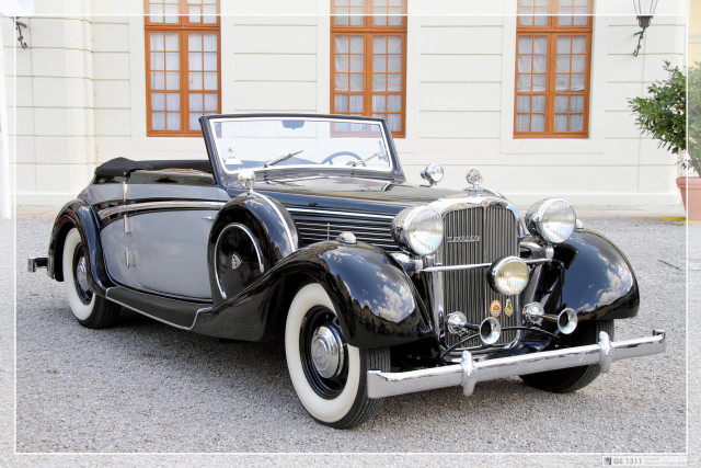 Black car parked building white free wallpaper for desktop - medium preview image