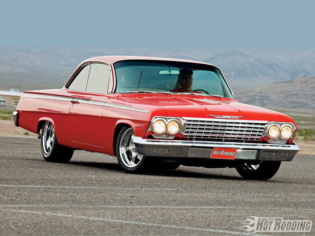 Red car parking lot mountains #6 free wallpaper for desktop - medium preview image