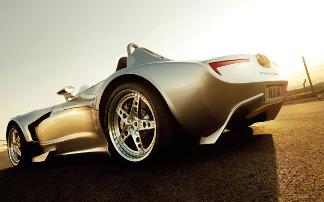 Silver sports car parked side free wallpaper for desktop - medium preview image