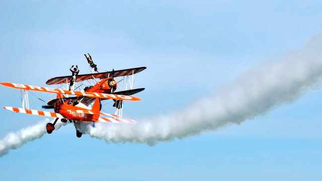 Two planes flying smoke trails free wallpaper for desktop - medium preview image