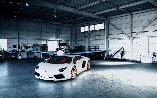 White sports car garage plane #2 free wallpaper for desktop - medium preview image