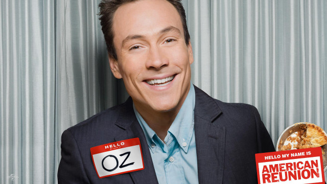 Man holding sign popcorn name free wallpaper for desktop - medium preview image